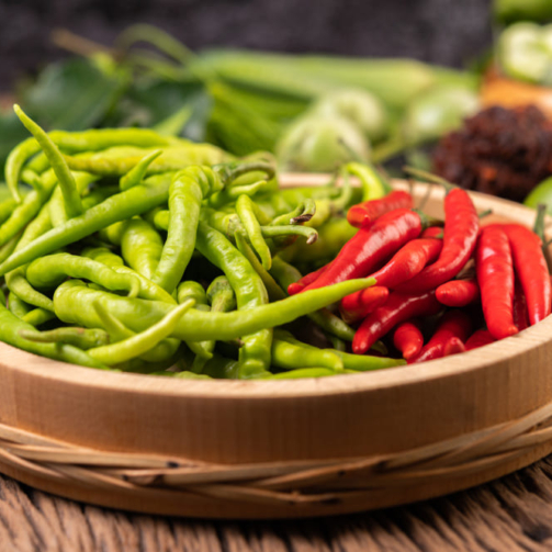 fresh-chili-wooden-tray-with-lemon-kaffir-lime-leaves (1)