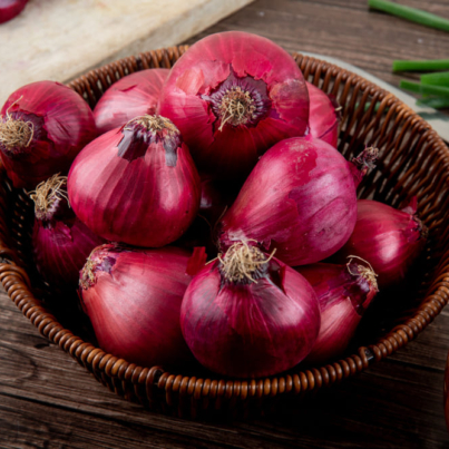 side-view-basket-full-red-onions-wooden-background (1)